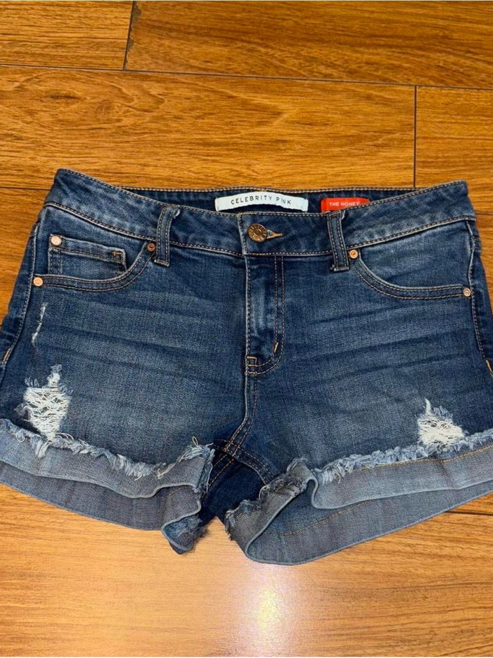 Distressed cuffed denim shorts